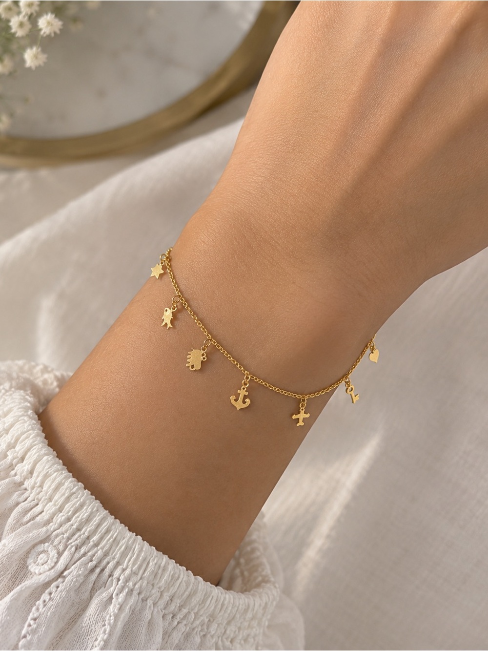 22k gold charm bracelet